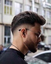 Thick mid fade for men