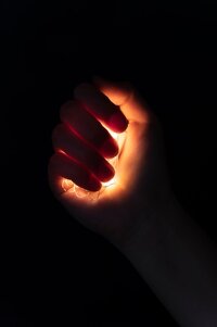 view-hands-tiny-lights_23-2150571044.jpg