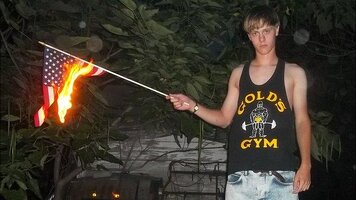 _83760335_burningflag.jpg