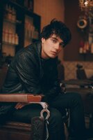 photo-of-man-sitting-on-chair-1819483.jpg