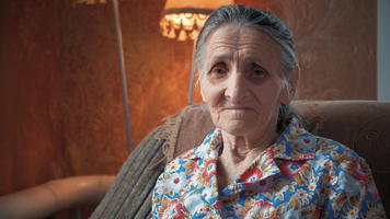 Videoblocks portrait of an elderly woman 80 90 years old at home old odd lady with wrinkled sk
