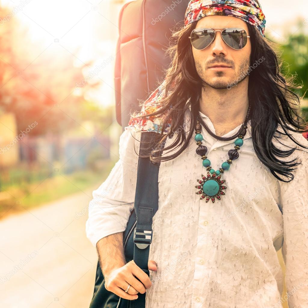 depositphotos_122927712-stock-photo-young-hippie-guy-with-long.jpg