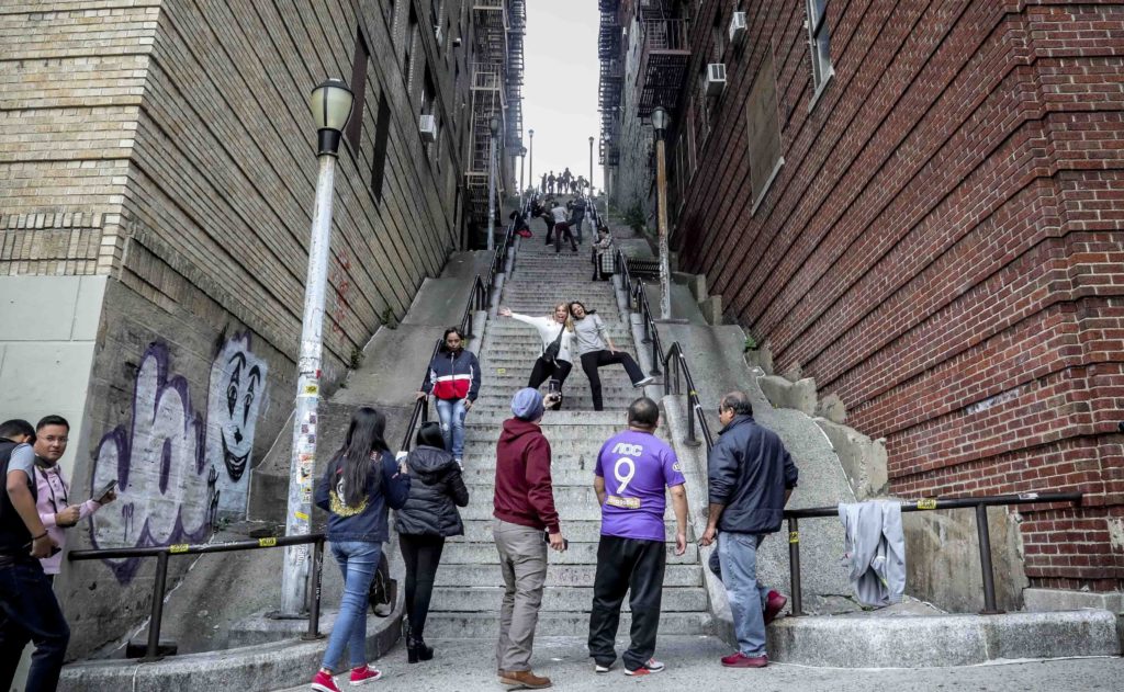 Visitors-dance-on-Joker-stairs-in-the-Bronx-October-2019-AP-Photo-by-Bebeto-Matthews-1024x631.jpg