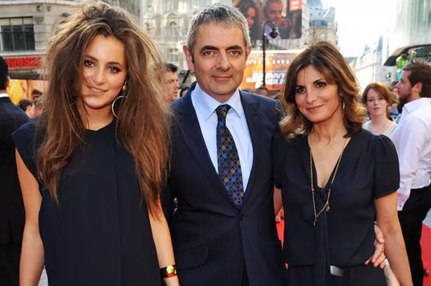 rowan-atkinson-attends-johnny-english-rebord-premiere-with-his-daughter-lily-and-wife-sunetra-sastry-pic-wire-259473537.jpg