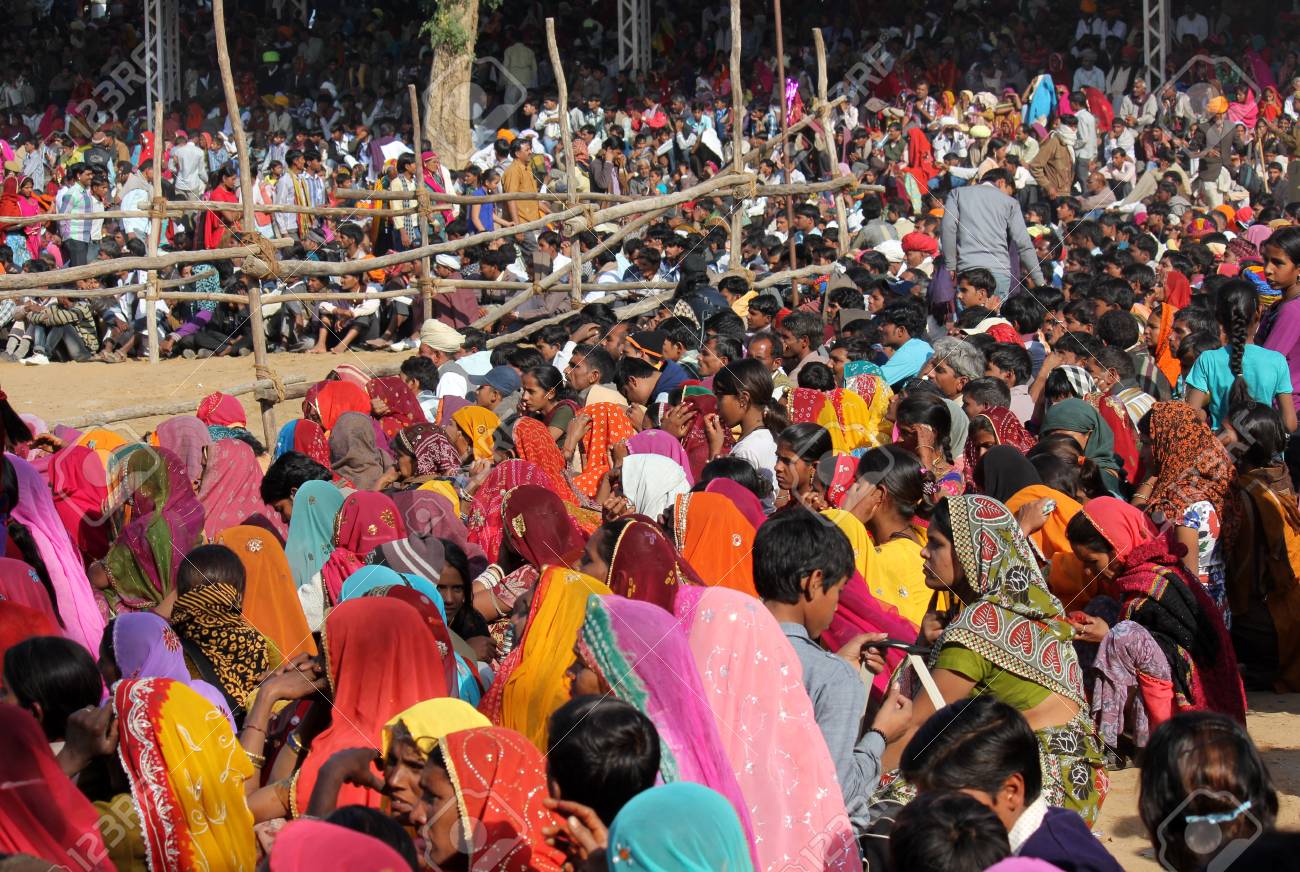 34722271-pushkar-india-crowd-of-people-at-pushkar-fair-in-the-indian-rajasthan-state-waiting-for-an-exhibitio.jpg