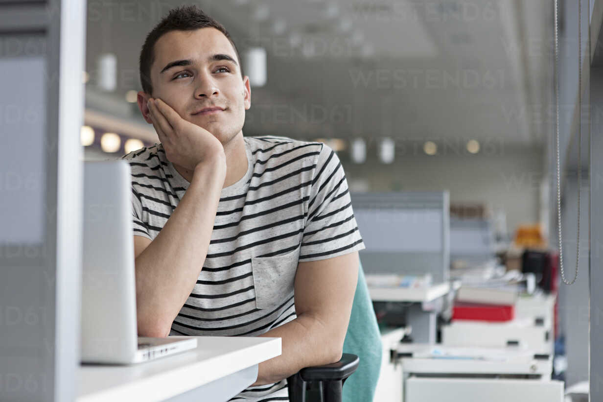 man-daydreaming-at-desk-ISF00563.jpg