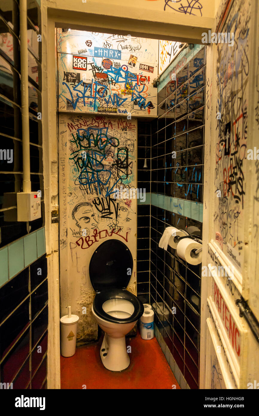 a-toilet-covered-in-grafitti-inside-a-london-pub-HGNHGB.jpg
