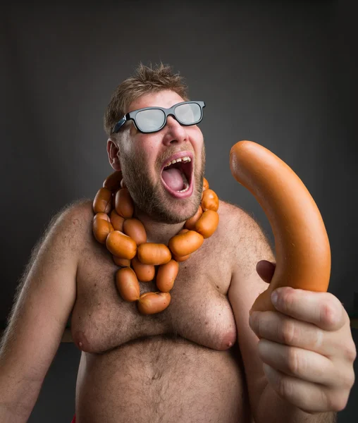 Hungry man with sausages Stock Photo by ©Nomadsoul1 79674654