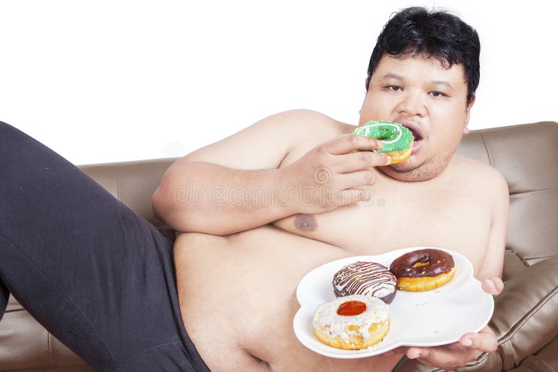 Fat man eating donuts stock image. Image of isolated - 80514263