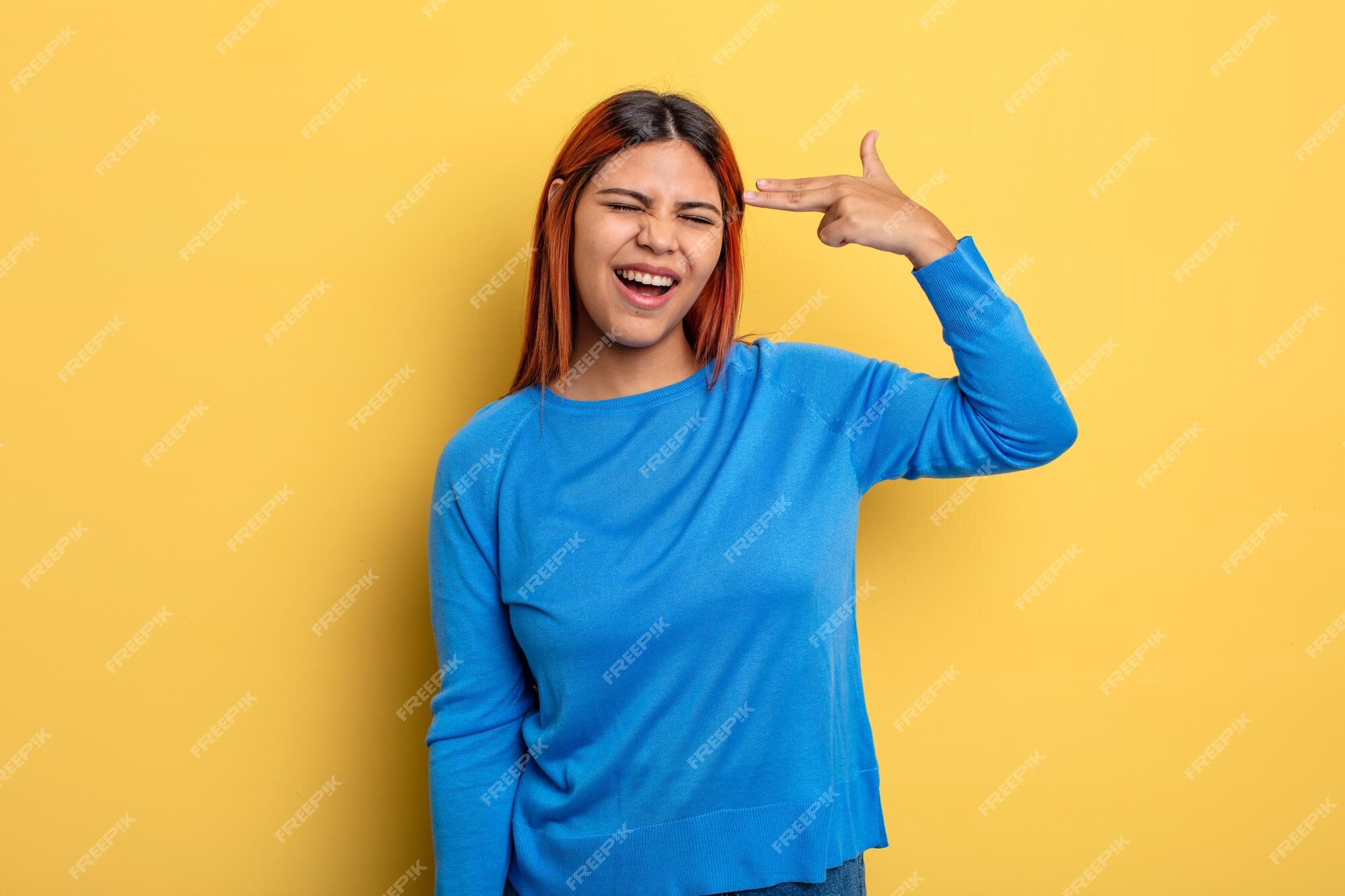 young-hispanic-woman-looking-unhappy-stressed-suicide-gesture-making-gun-sign-with-hand-pointing-head_1194-341502.jpg