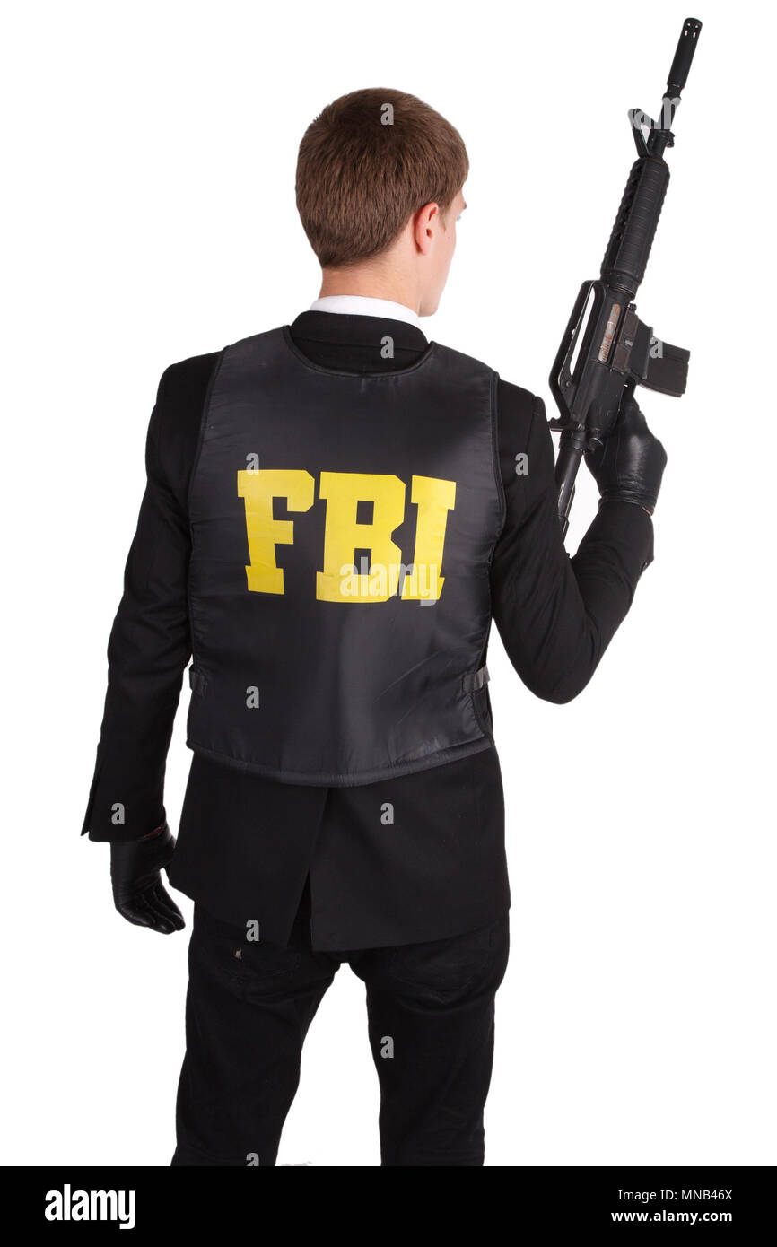 FBI Agent with rifle isolated on white Stock Photo - Alamy