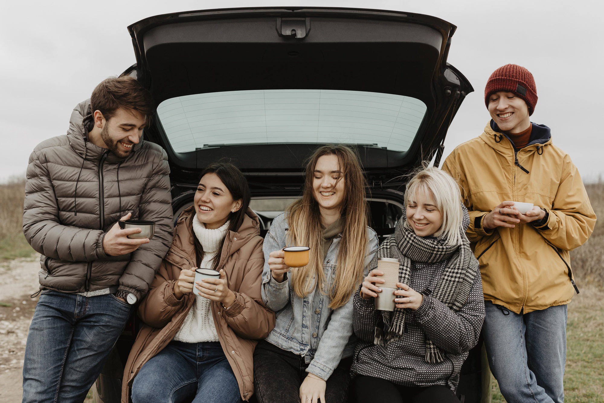 smiley-group-friends-road-trip-break_23-2148375052.jpg