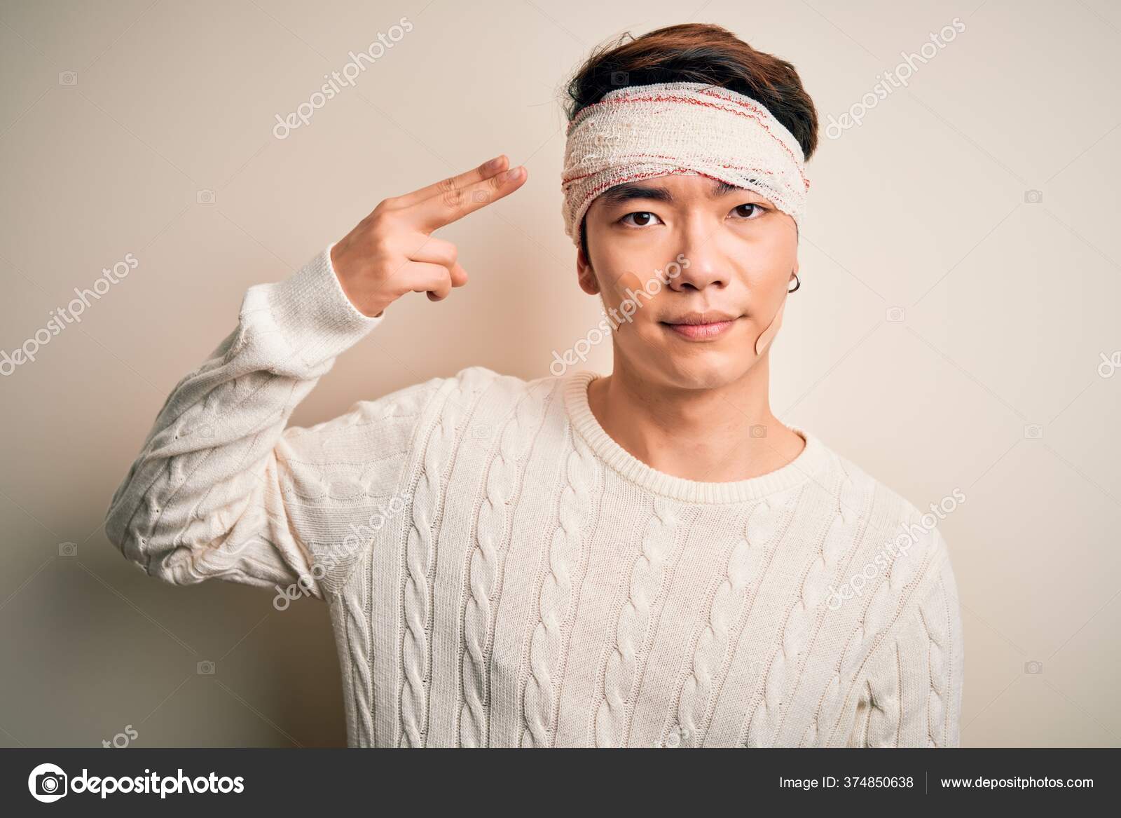 depositphotos_374850638-stock-photo-young-handsome-chinese-man-injured.jpg