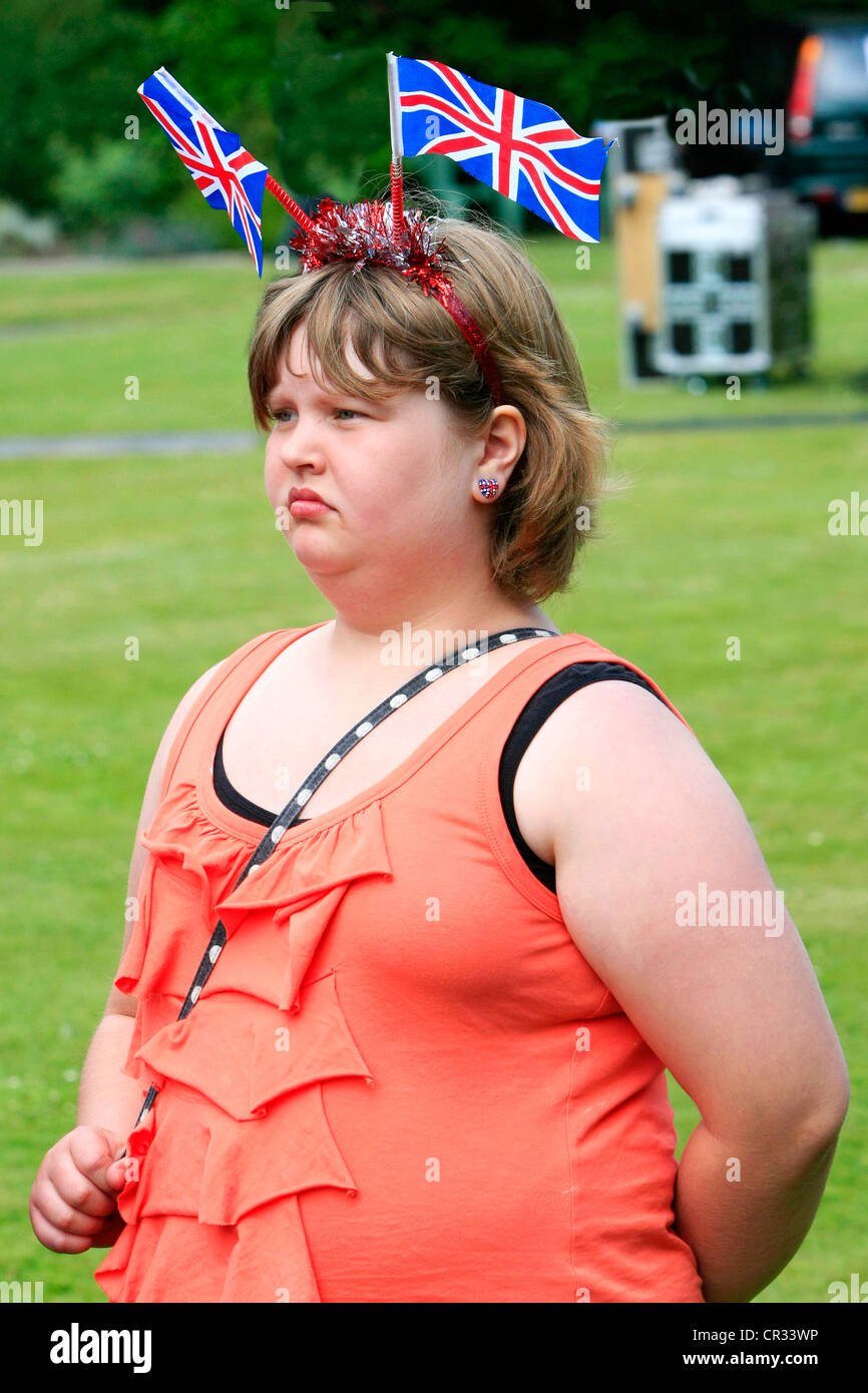 obese-unhappy-teenage-girl-wearing-a-union-jack-flag-headband-CR33WP.jpg