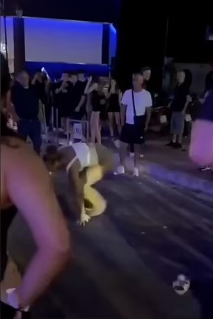 two-women-street-fight-man-916246796.jpg