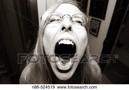 girl-screaming-with-mouth-wide-open-stock-photograph__n86-524519.jpg