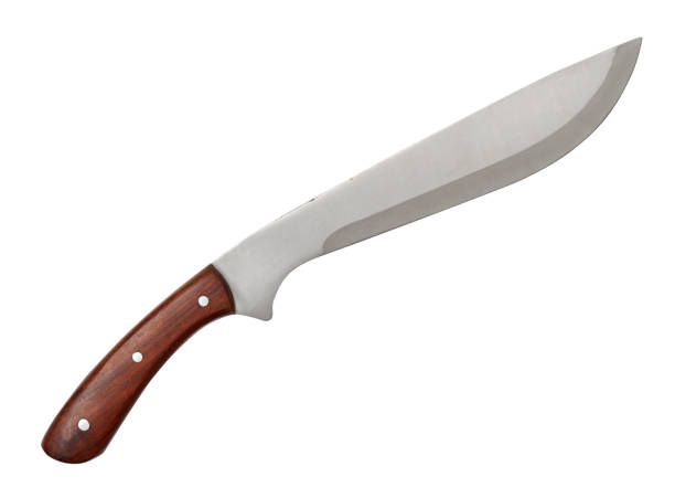 machete with wooden handle A machete with wooden handle isolated on a white background with clipping path machete blade stock pictures, royalty-free photos & images