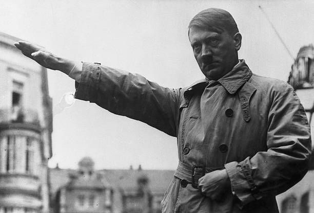 Picture shows Adolf Hitler extending his hands in the Fascist salute.