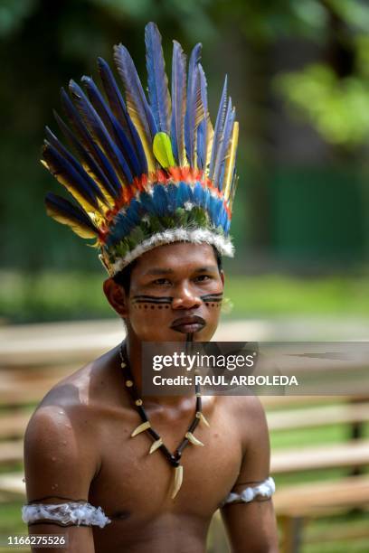 a-colombian-tikuna-indigenous-man-attends-the-presidential-summit-for-the-amazon-at-the.jpg
