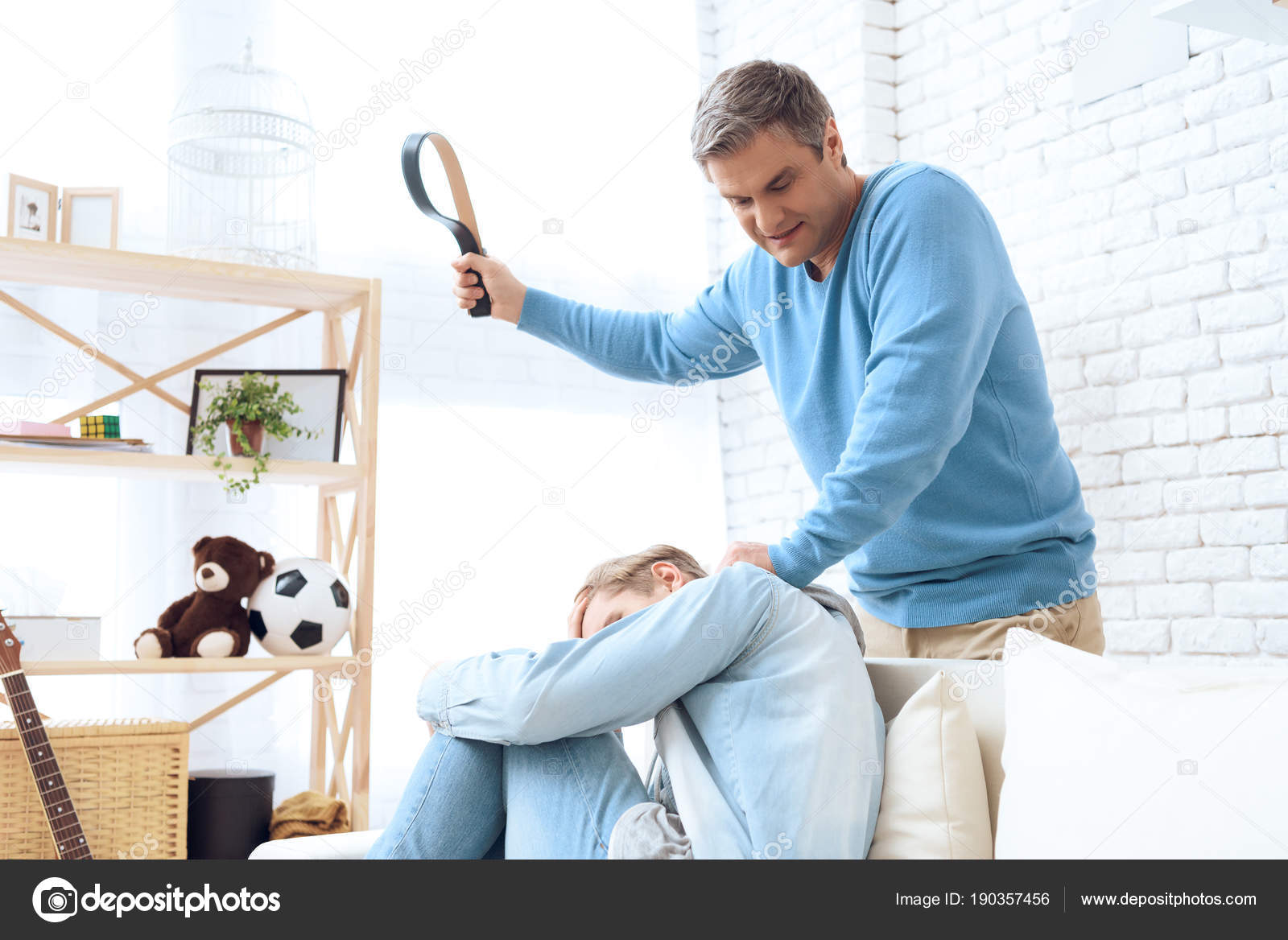 depositphotos_190357456-stock-photo-father-hitting-belt-son-while.jpg