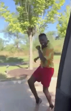 friday-dance-black-guy-beside-car-0fc1y4enb4xi1eur.gif