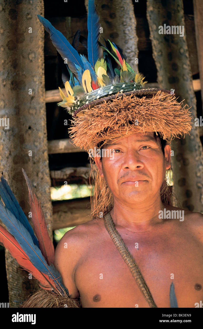 man-wearing-a-traditional-feathered-headdress-in-the-amazon-region-BK3EN9.jpg
