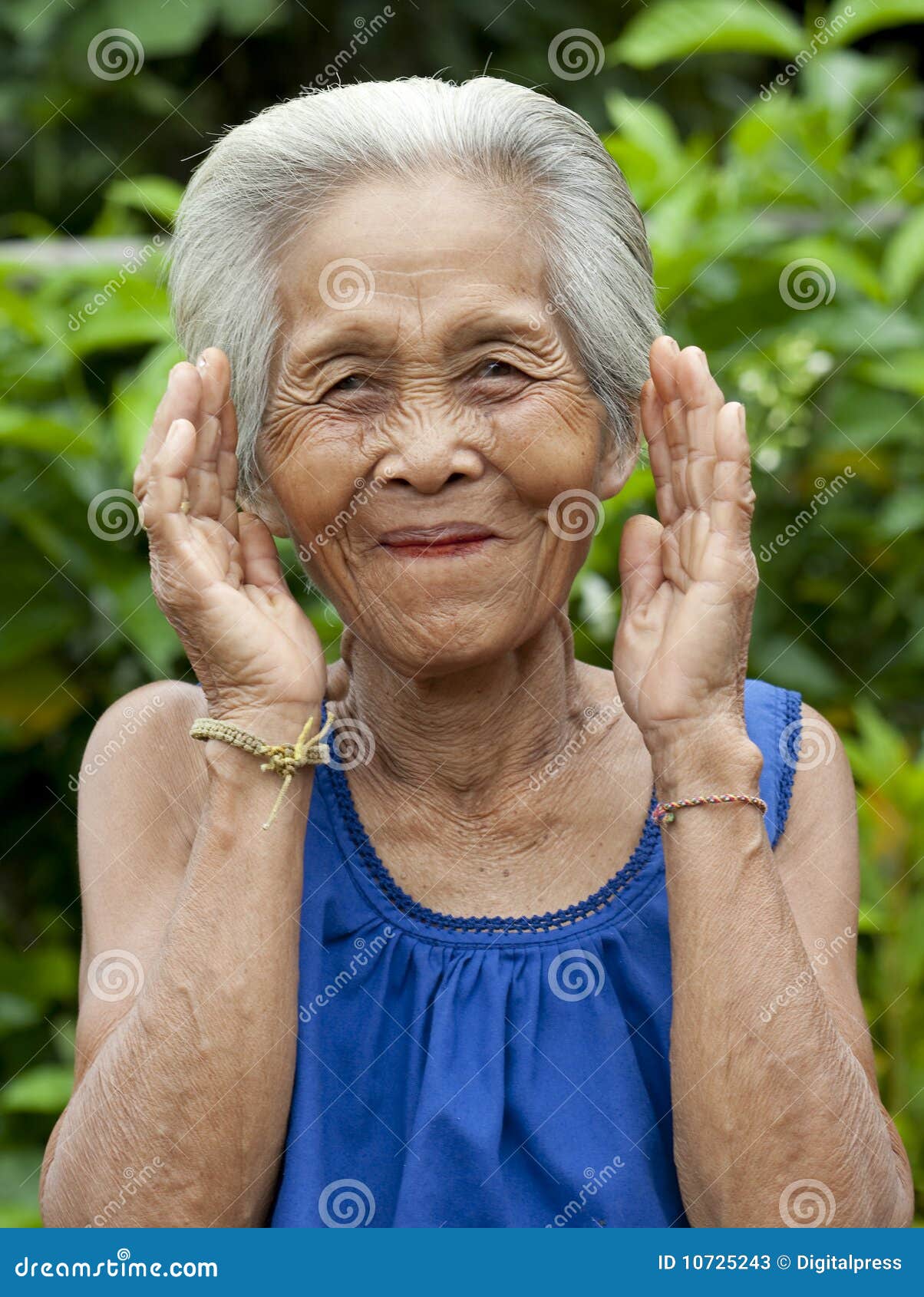 portrait-old-asian-woman-gestures-10725243.jpg