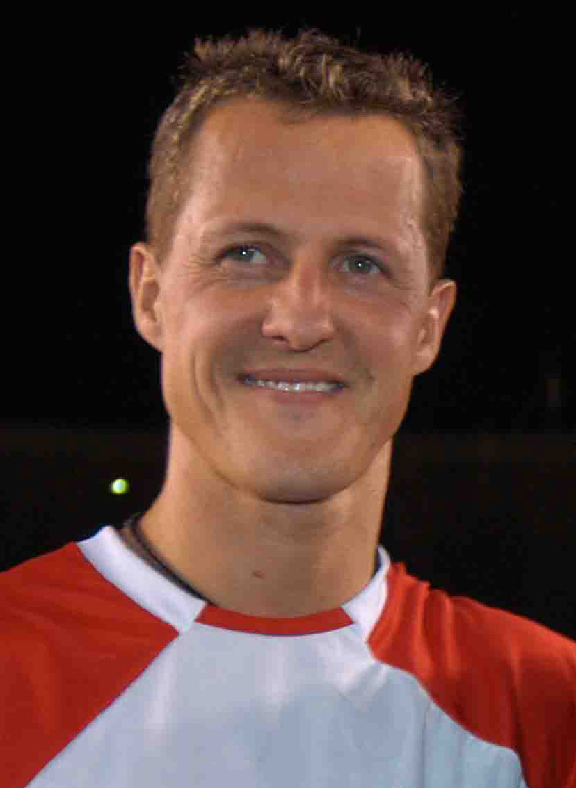 A%C3%A9cio_Neves%2C_Michael_Schumacher_e_Didi_%28Cropped%29.jpg