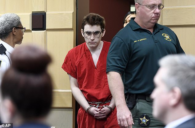 Suspect Nikolas Cruz appeared in court Friday suspected of killing 17 at Marjory Stoneman Douglas High School