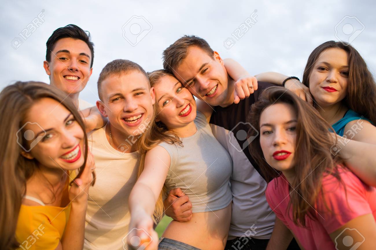 Group Of Happy Young People Laughing, Outdoors Stock Photo ...