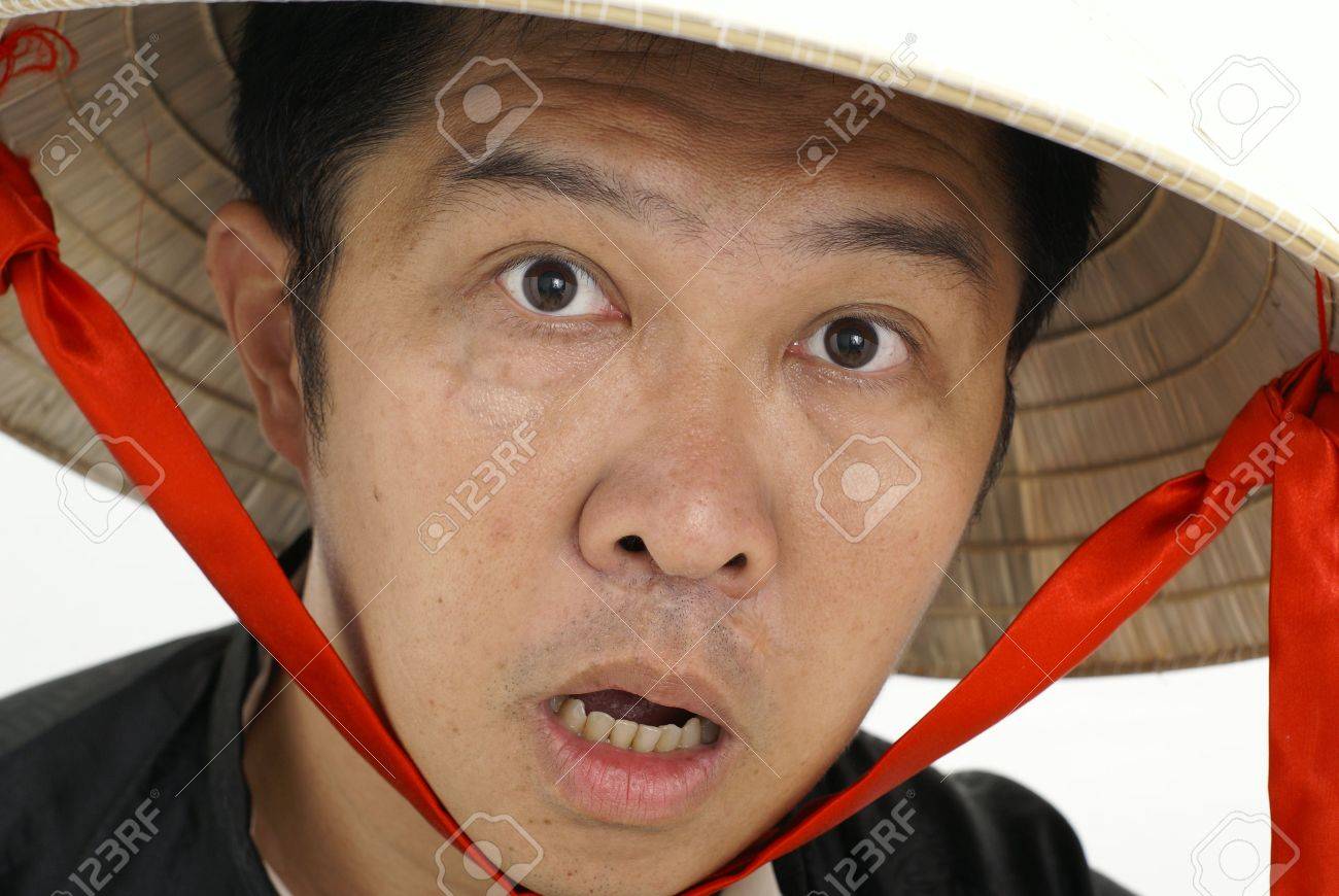 4413527-surprised-asian-man-wearing-concial-hat.jpg