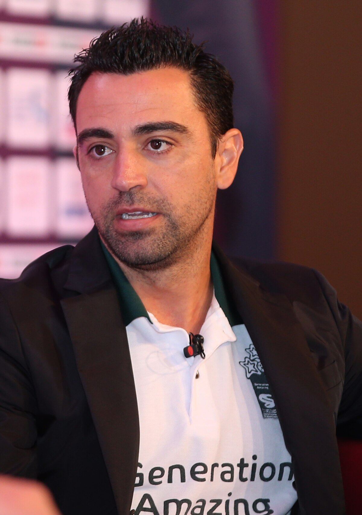 1200px-Xavi_Hernandez_%2831521652051%29.jpg