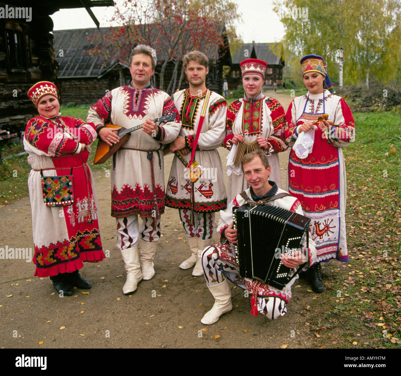 a-russian-folk-music-group-in-traditional-clothing-in-a-small-remote-AMYH7M.jpg