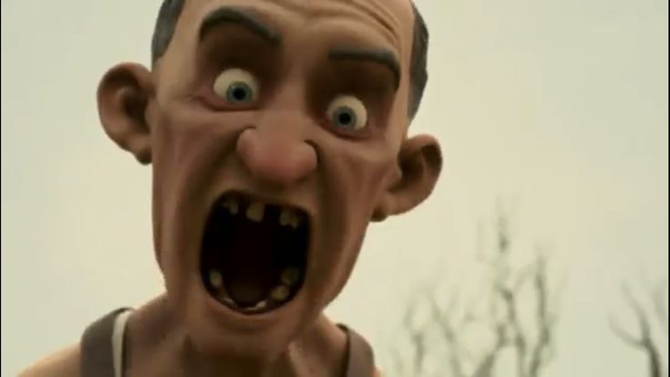 This may contain: a creepy looking man with his mouth open