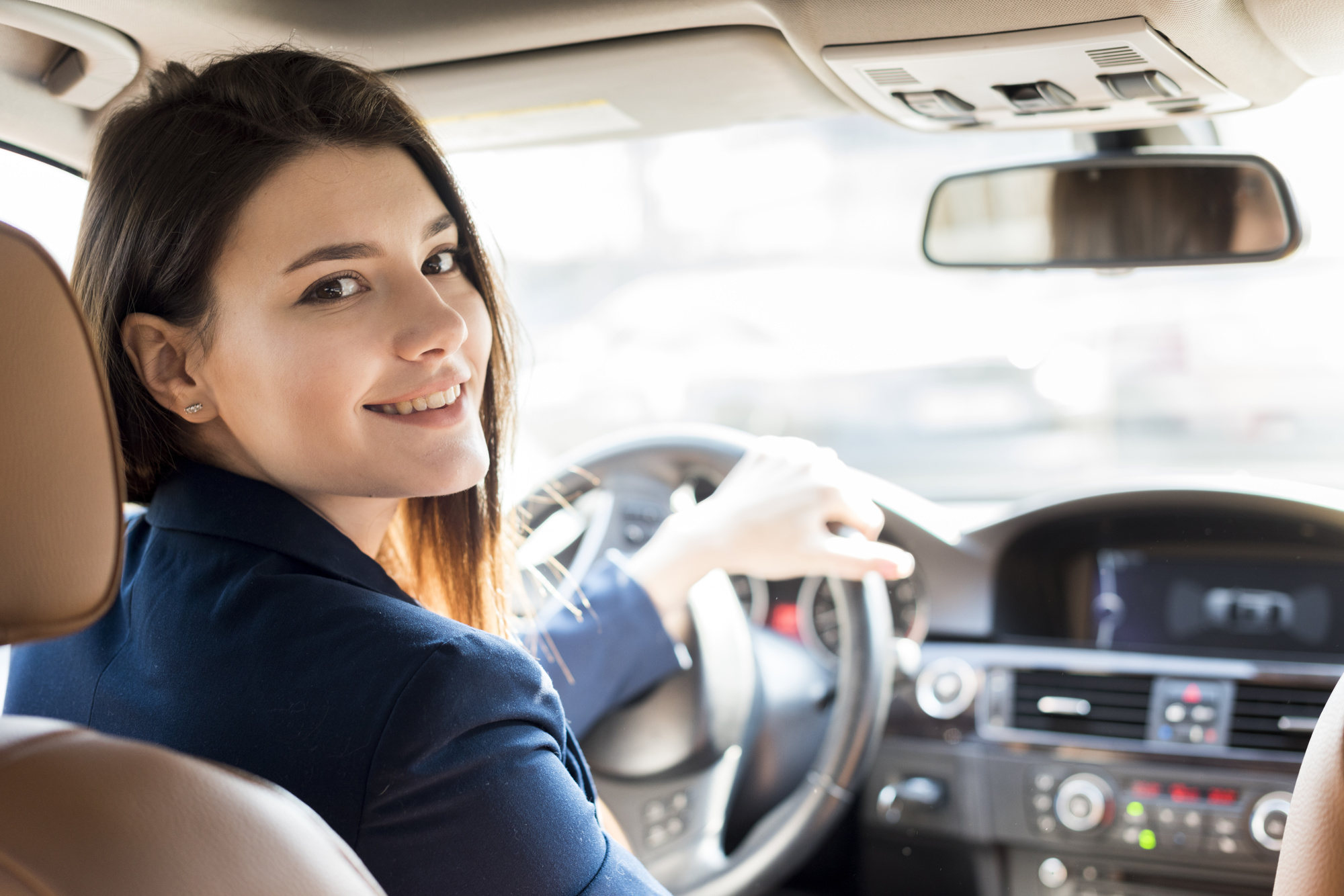 brunette-businesswoman-driving_23-2148142626.jpg