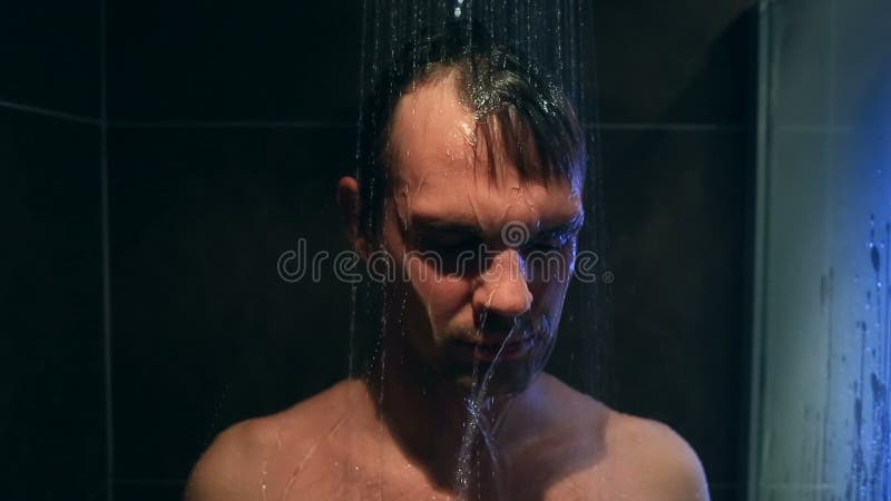 tired-man-washes-shower-did-not-get-enough-sleep-94257922.jpg
