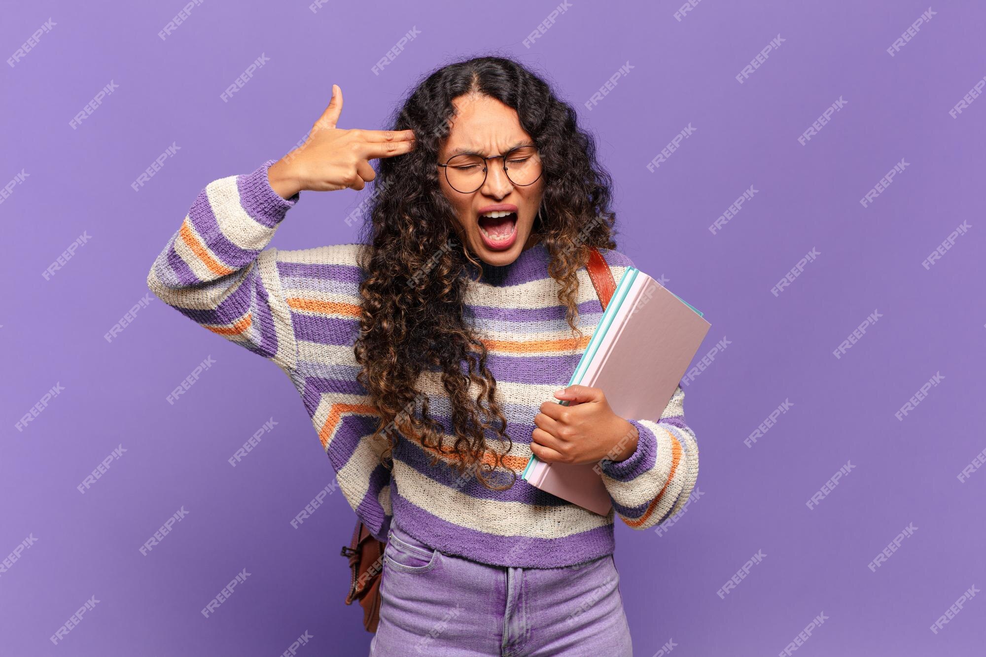 young-hispanic-woman-looking-unhappy-stressed-suicide-gesture-making-gun-sign-with-hand-pointing-head-student-concept_1194-361975.jpg