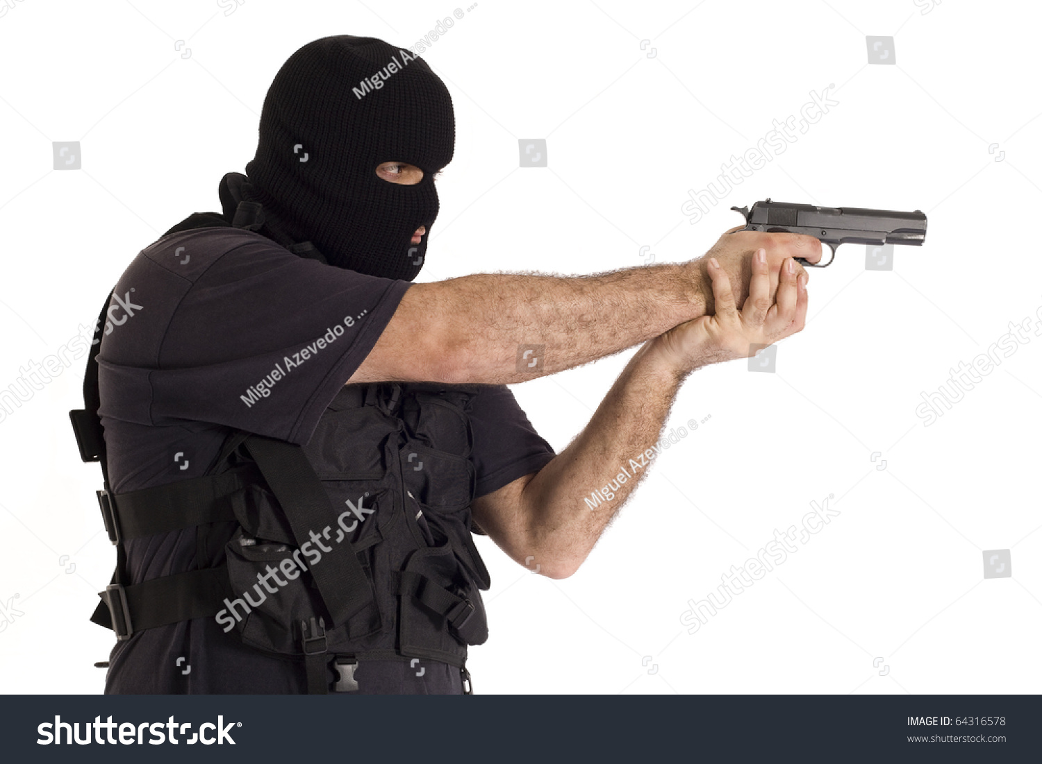stock-photo-undercover-policeman-wearing-a-hood-balaclava-aiming-sideways-with-a-semi-automatic-gun-64316578.jpg