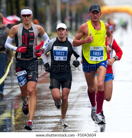 stock-photo-bucharest-romania-october-a-group-of-unidentified-marathon-runners-compete-at-the-bucharest-95043604.jpg