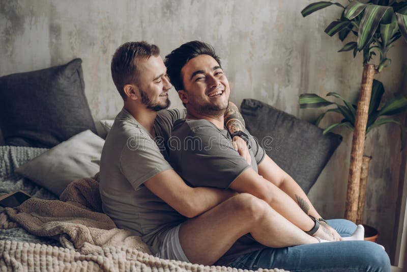 two-sexy-caucasian-gay-guys-hugging-having-fun-bed-indoors-indoor-shot-best-diverse-friends-sitting-close-bed-132941069.jpg
