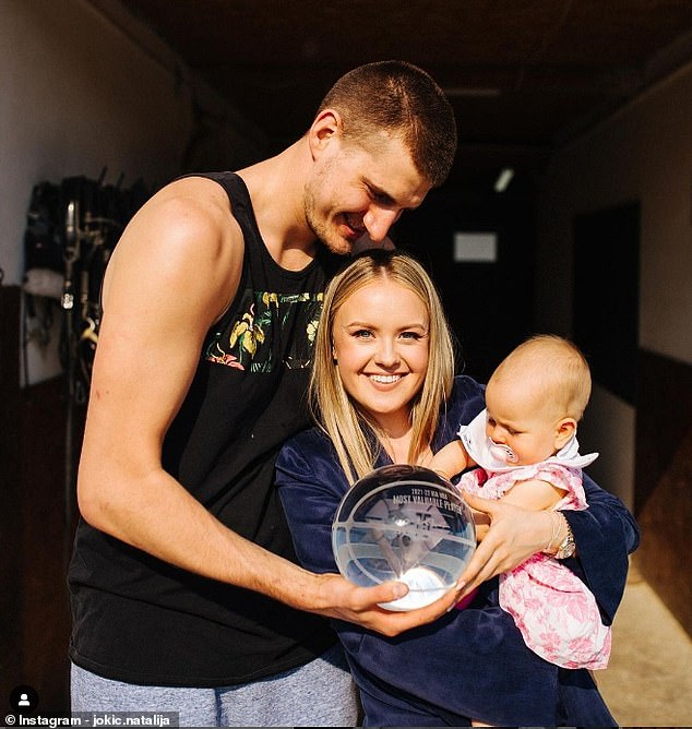 71709051-12153585-Nikola_Jokic_is_pictured_with_his_wife_Natalija_and_their_young_-a-1_1685739137488.jpg