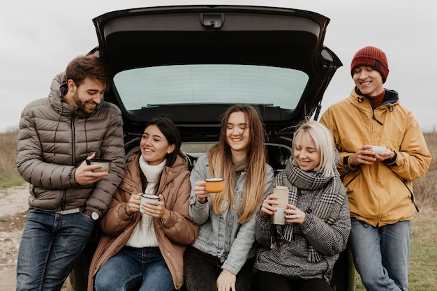 smiley-group-friends-road-trip-break_23-2148375052.jpg
