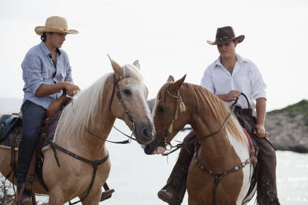 84020556-men-riding-horses.jpg