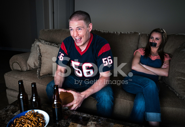 40636734-couple-watching-tv-football-excited-guy-and-bored-girl.jpg