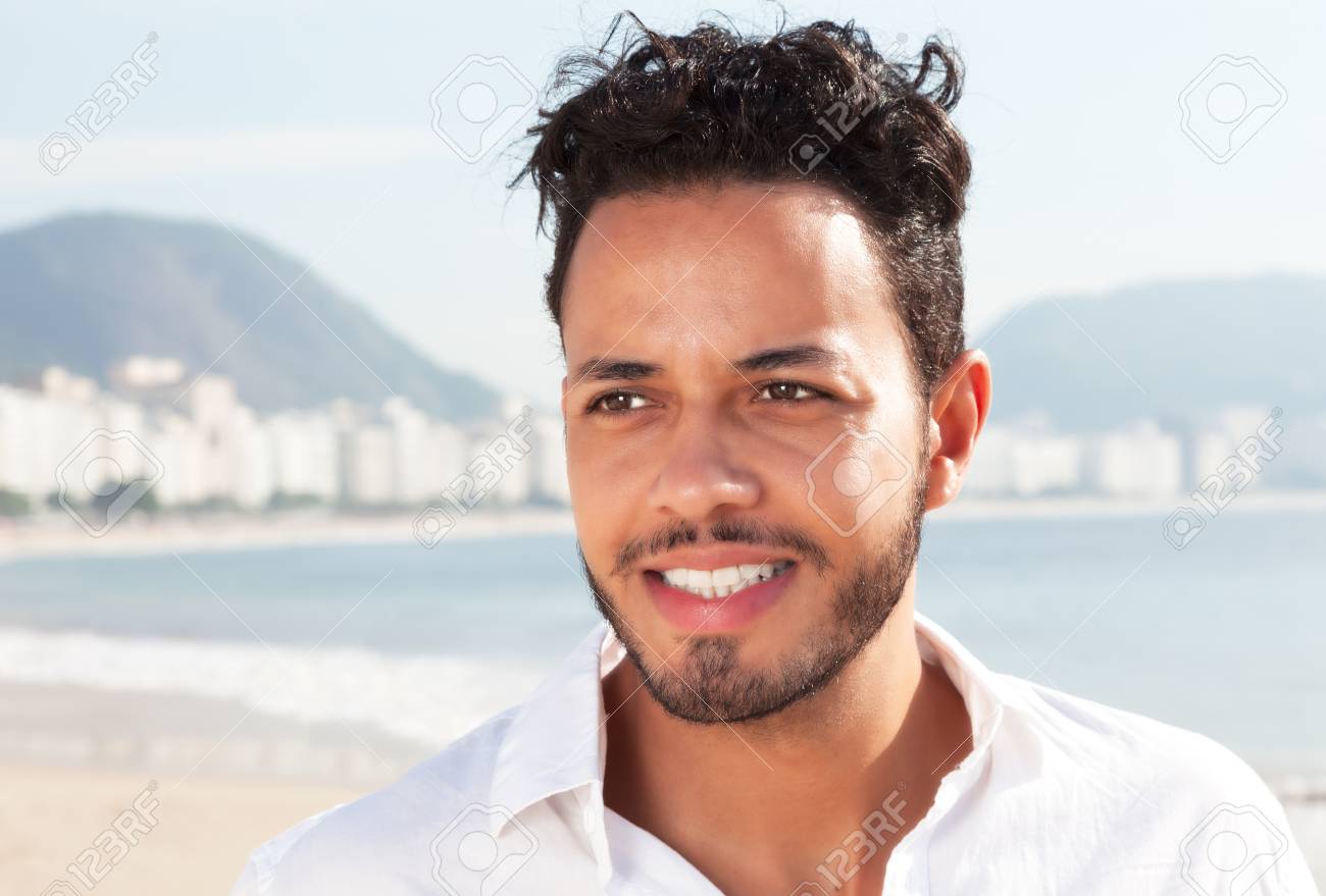 37503902-attractive-brazilian-man-at-copacabana-beach.jpg