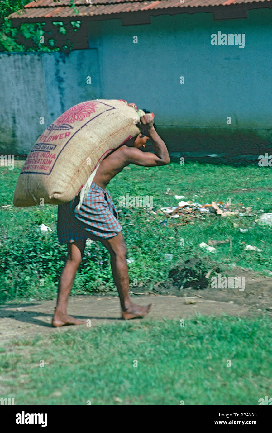 Man carrying sack on his back hi-res stock photography and images - Alamy