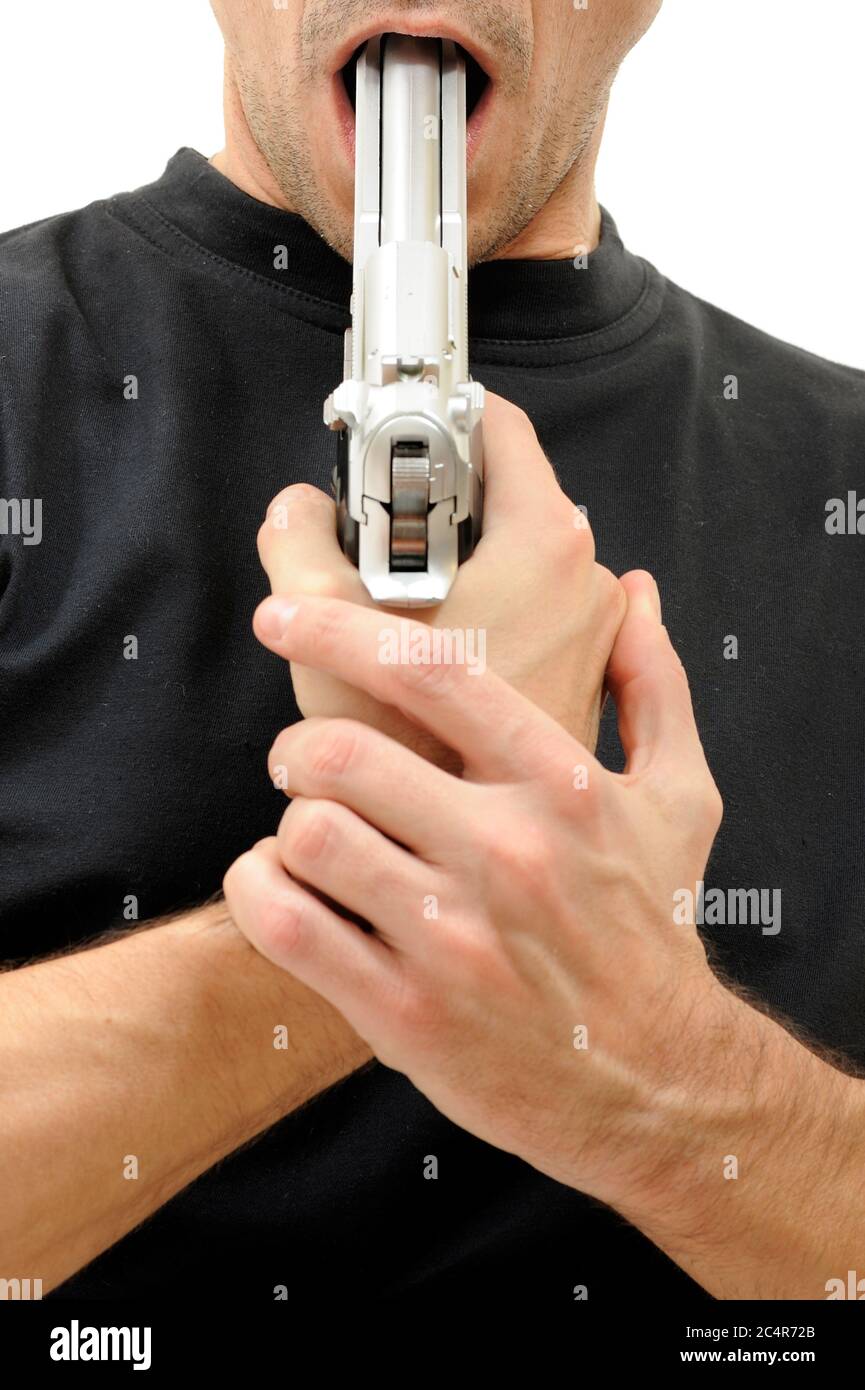 Man with gun in her mouth Stock Photo - Alamy