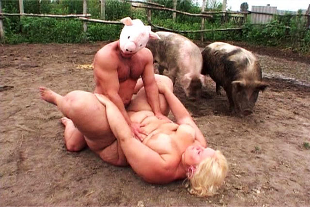 fat_blonde_slut_fucked_in_the_mud_with_pigs.jpg