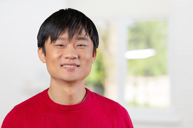 Free Photo | Handsome young asian man smiling