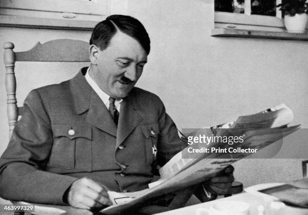 good-news-1936-german-nazi-leader-adolf-hitler-enjoying-something-he-has-read-in-the-newspaper.jpg